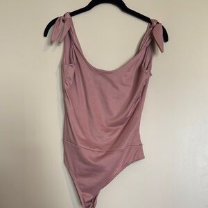 Lulu's Pink Asymmetrical Tie Front Bodysuit